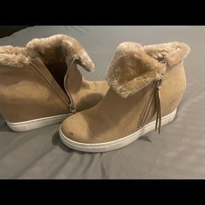 Tan wedge boots worn several times. Decent condition